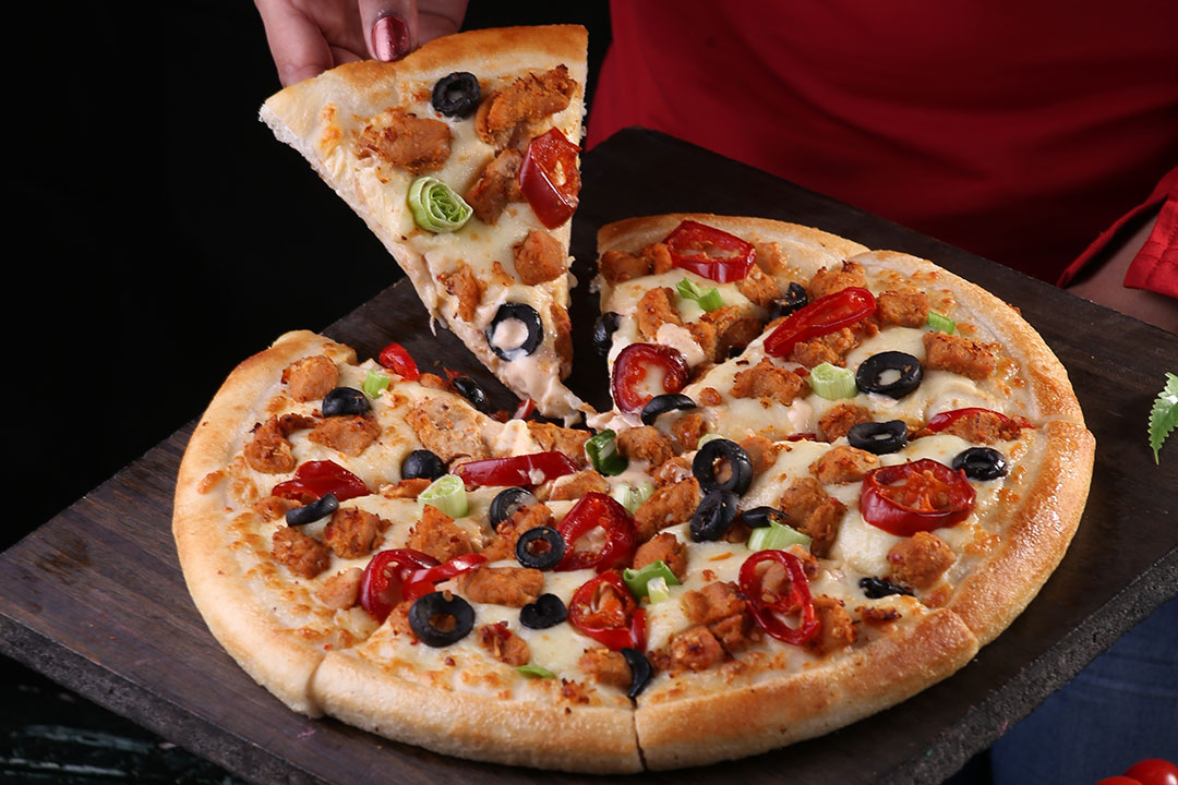 difference between hand tossed and pan pizza